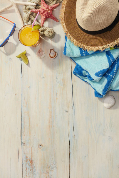 Beach items on a wooden background - Photo, Image