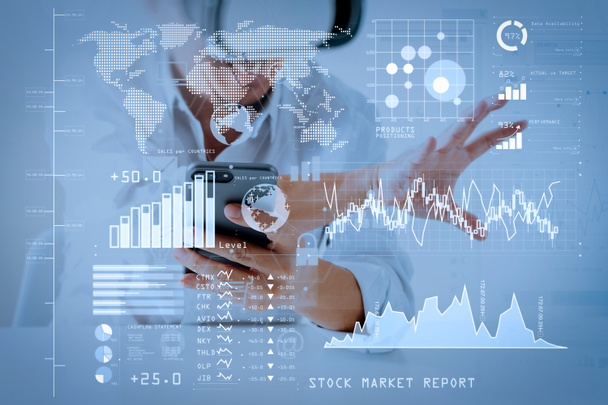 Investor analyzing stock market report and financial dashboard with business intelligence (BI), with key performance indicators (KPI).businessman wearing virtual reality goggles in modern office. - Photo, Image