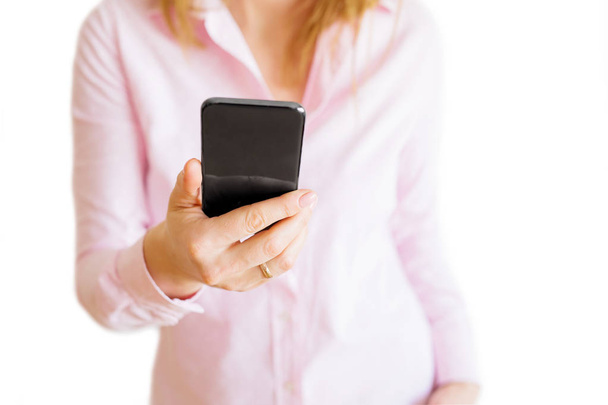 Woman using mobile phone. Isolated on white background. - Photo, Image