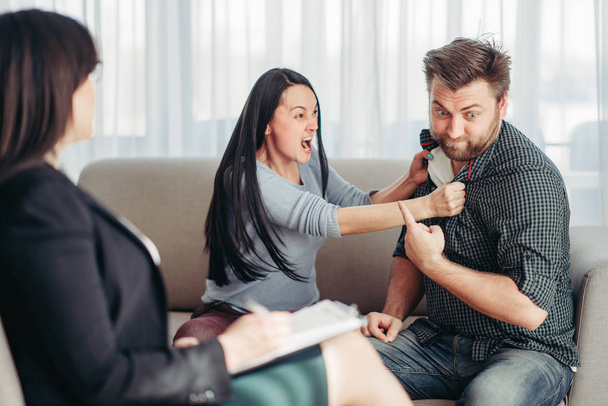 crazy angry husband and wife at psychologist, family conflict - Foto, immagini