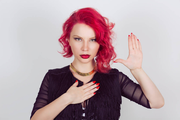 Woman witness making a promise or testifies hands gesture. Red head curly bob hairstyle girl isolated light gray grey white background. Mixed race latin hispanic caucasian fashion model - Φωτογραφία, εικόνα