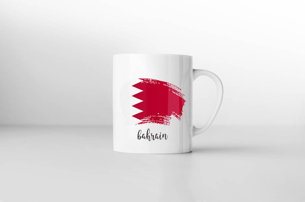 Bahrain flag souvenir mug on white background. 3D rendering. - Photo, Image
