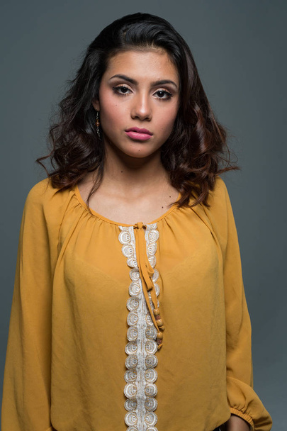 Hispanic teen girl modeling in a portrait session - Foto, Bild