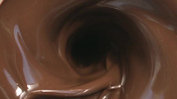 Spritzer Schokolade im Whirlpool - Filmmaterial, Video