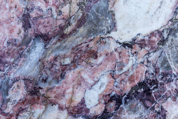 Stone background, multicolored marble slab with various lines and cracks - Photo, Image