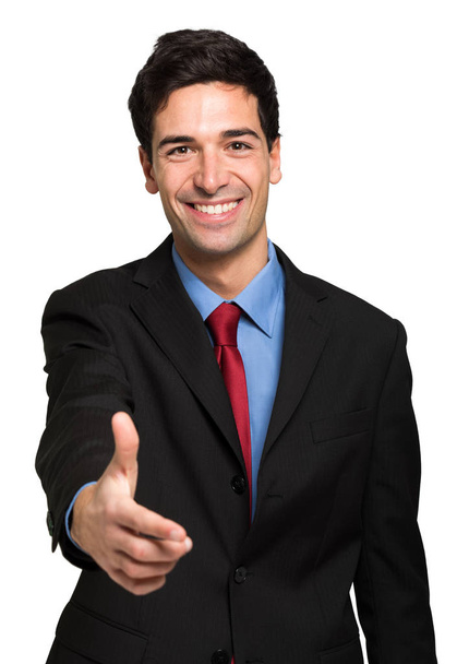 Businessman giving you a handshake - Фото, зображення
