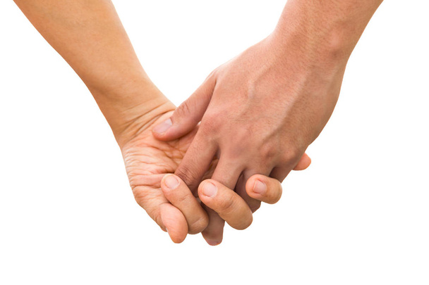 Couple Holding Hands on white background with clipping path. (Soft focus) - Foto, imagen