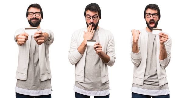 Set of Surprised Hipster man holding a credit card - Photo, Image