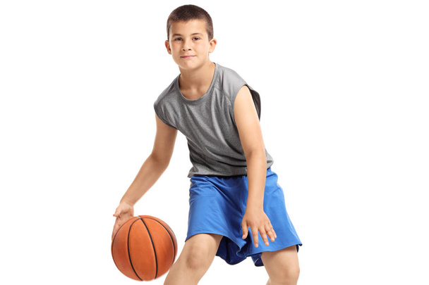 Boy playing basketball isolated on white background - Photo, Image