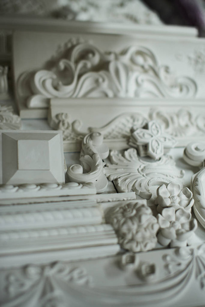 close up of white molding details at workshop - Fotoğraf, Görsel