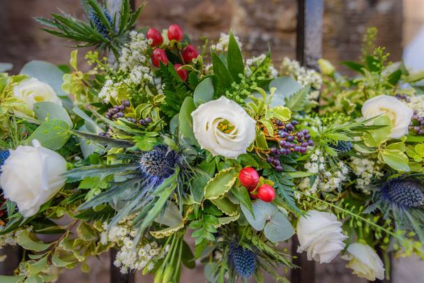 Διακοσμητικά γάμου λουλούδια σε ένα χώρο Σκωτίας γάμου. - Φωτογραφία, εικόνα
