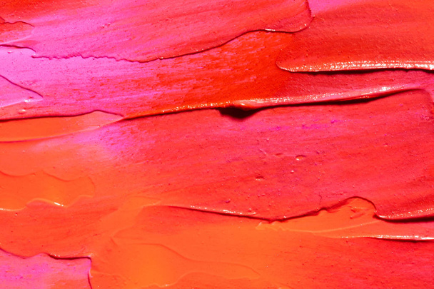 Smudged lipsticks textured background - Foto, afbeelding