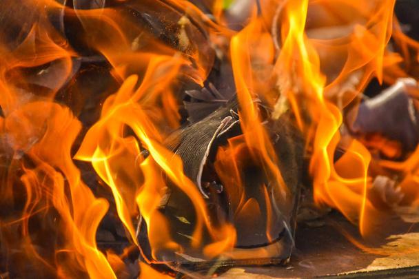 Abstract background of fire, coals, flames and twisting elements of ash - Photo, Image