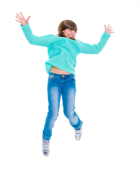Egy tizenéves lány jumping - Fotó, kép