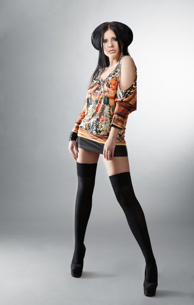 Portrait of a girl in stockings and dress - Fotografie, Obrázek