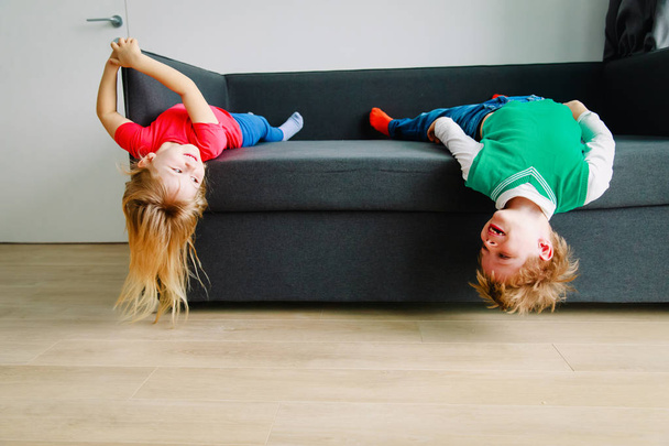 kids- little boy and girl- have fun play at home - Fotó, kép