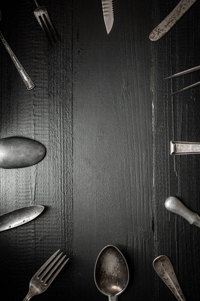 Old Rustic Cutlery on Dark Wooden Background. Kitchen and Food Concept. - Valokuva, kuva