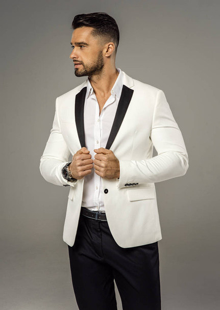 Handsome man wear white jacket - Foto, afbeelding