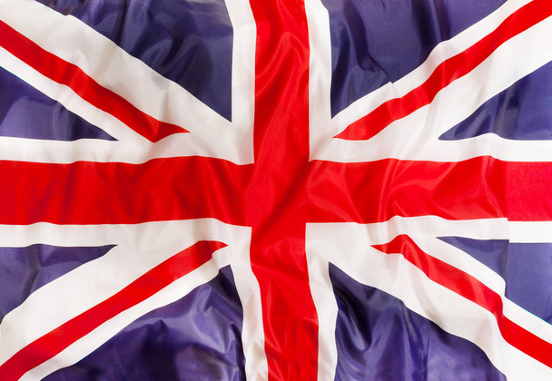 UK United Kingdom country independent state national flag banner close-up with waving fabric texture  - Valokuva, kuva