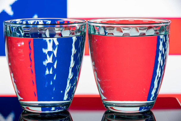 Two blue multi-faceted glasses on a different background - Photo, image