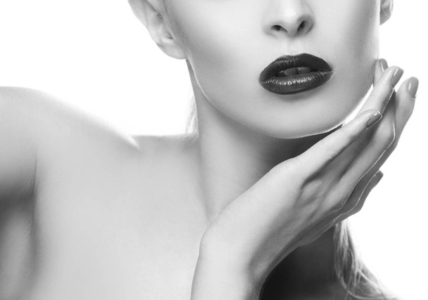 Cropped portrait of woman with dark lips and painted fingernails - Foto, Imagen