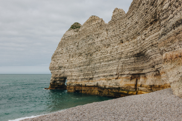 beautiful calm sea near cliff, Etretat, Normandy, France - Фото, зображення