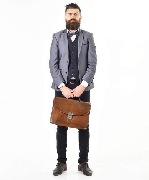 Portrait of man with vintage suitcase - Фото, изображение