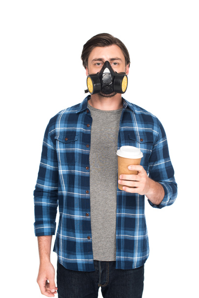 man in respirator holding coffee cup isolated on white background  - Photo, Image