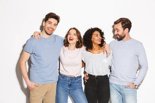 Group of happy multiracial people standing together and laughing isolated over white background - Photo, Image