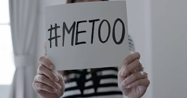 woman with  me too billboard. sexual harassment - Foto, Bild