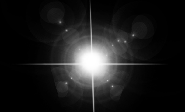 Abstract lens flare light over black background - Photo, Image