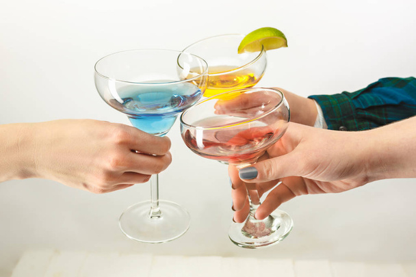 The male and female hands with exotic cocktails - Foto, immagini