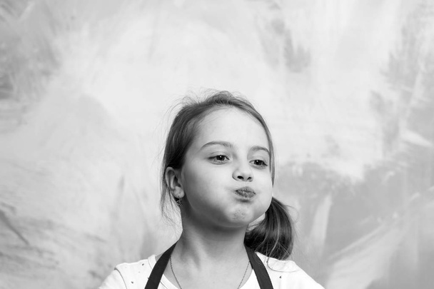 Girl eating with mouth full of food - Фото, зображення