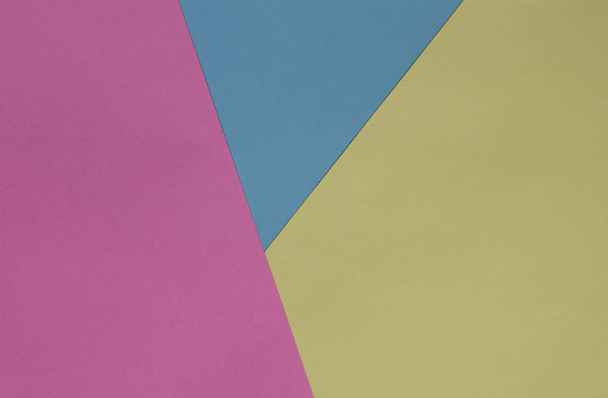 Fond de papier géométrique créatif. Couleurs pastel rose, bleu, jaune. L'abstraction. Un modèle. Vue du dessus
. - Photo, image