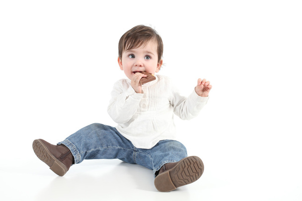Baby eating chocolate - Φωτογραφία, εικόνα
