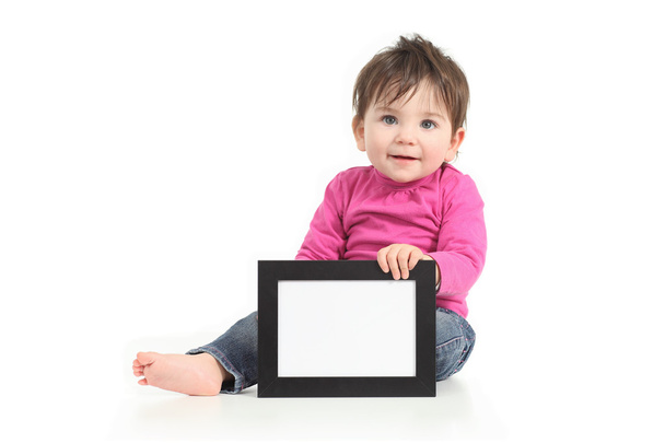 Baby showing a blank picture frame - Foto, Imagen