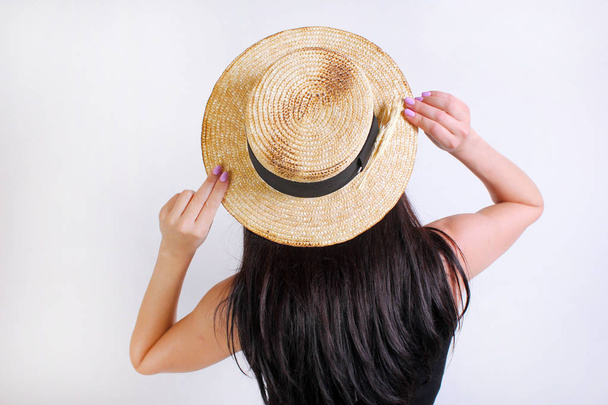 fashion. young woman in fashionable blouse and hat on a white background - Photo, image