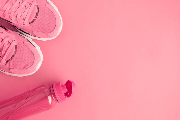Flat lay of sport exercise equipment pastel pink minimal creative concept. Space for copy. - Foto, afbeelding