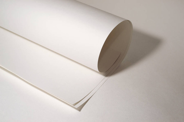 White sheet of paper on a white background - Zdjęcie, obraz