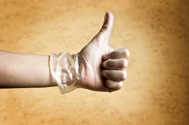 Hand with protective glove - Photo, Image