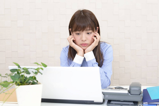 Asian business woman is feeling tired and stressed - Photo, Image