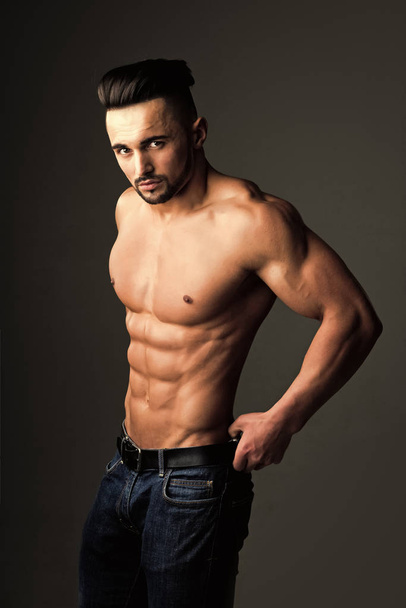 Handsome man face. Man with muscular body and bare chest or coach sportsman - Fotó, kép