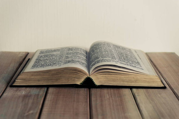 Bible on a new wooden table. Beautiful background. Religion concept - Foto, Imagem