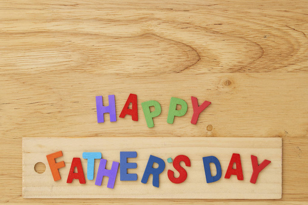 Happy Fathers Day wooden letter with tools on a rustic wood background - Foto, immagini