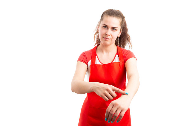 Woman supermarket or hypermarket supervisor making late gesture as upset bossy employer concept isolated on white background - Photo, Image