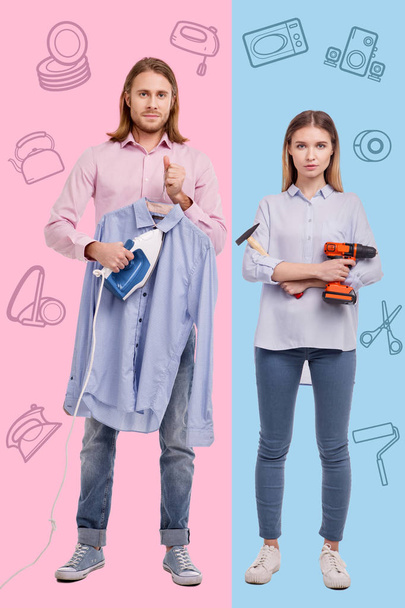 Confident couple standing together and getting ready for doing housework - Zdjęcie, obraz
