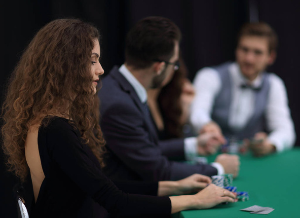 luckiest woman on the background of the players in the casino. - Photo, Image