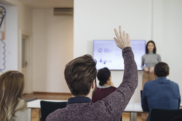 Man Raising Hand During Lecture - Photo, Image