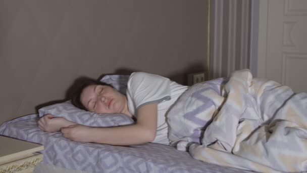 Restless dreams. A young woman has a nightmare - Footage, Video