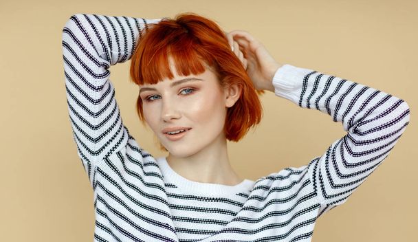 Portrait of young woman with red hair and natural skin texture - Foto, Imagem